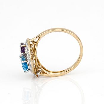 RING, 14K guld med citriner, ametister, blå topas och små diamanter. Vikt ca 3,70 g.