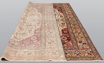 A carpet, Tabriz, ca 392 x 291 cm.