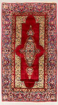 Oriental rug, approximately 210x119 cm.