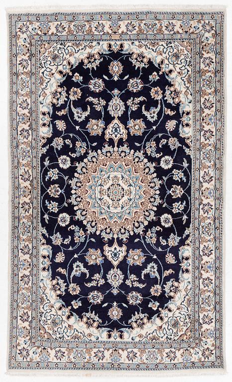 A Nain carpet, c. 255 x 150 cm.