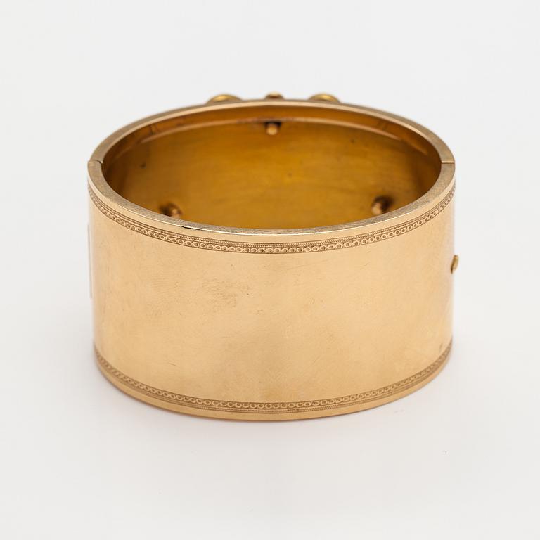 Armband, 18K guld, emalj. Olof Robert Lundgren, Åbo 1859 eller 1874.