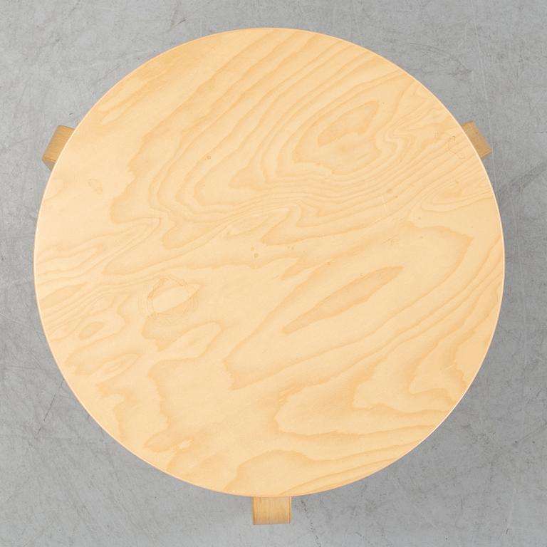 A bench and a stool by Alvar Aalto, from around the year 2000.