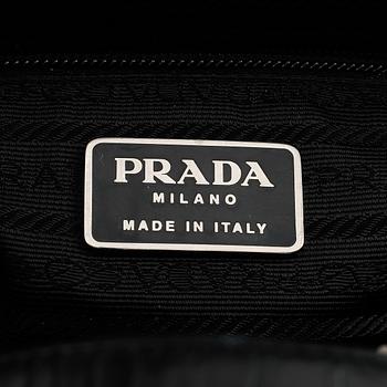 Prada, a patent leather bag.