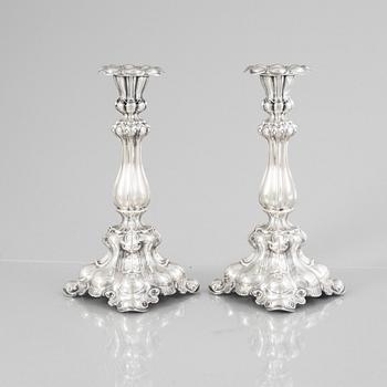 A pair of Baroque style silver candlesticks, mark of CG Hallberg, Stockholm 1936.