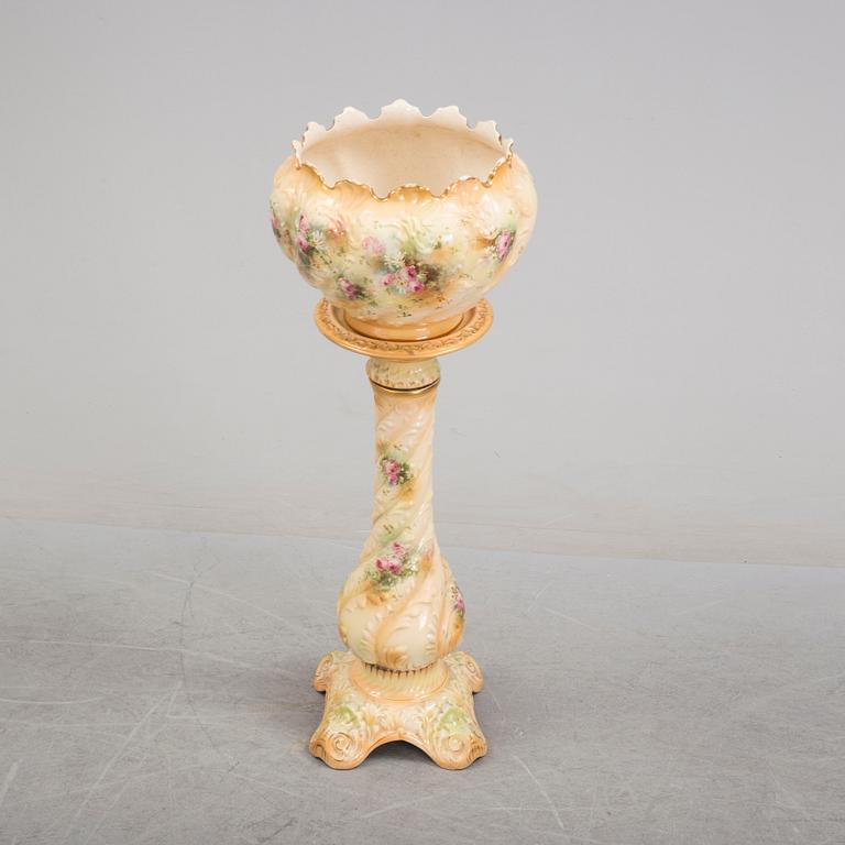 An early 20th century pedestal and flowerpot.
