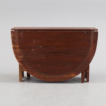 A 19th century painted flap table.