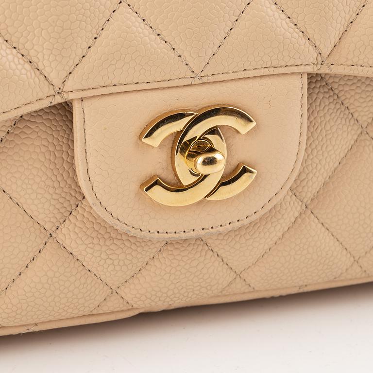 Chanel, A 'Classic Flap Jumbo' caviar leather bag, 2009-2010.