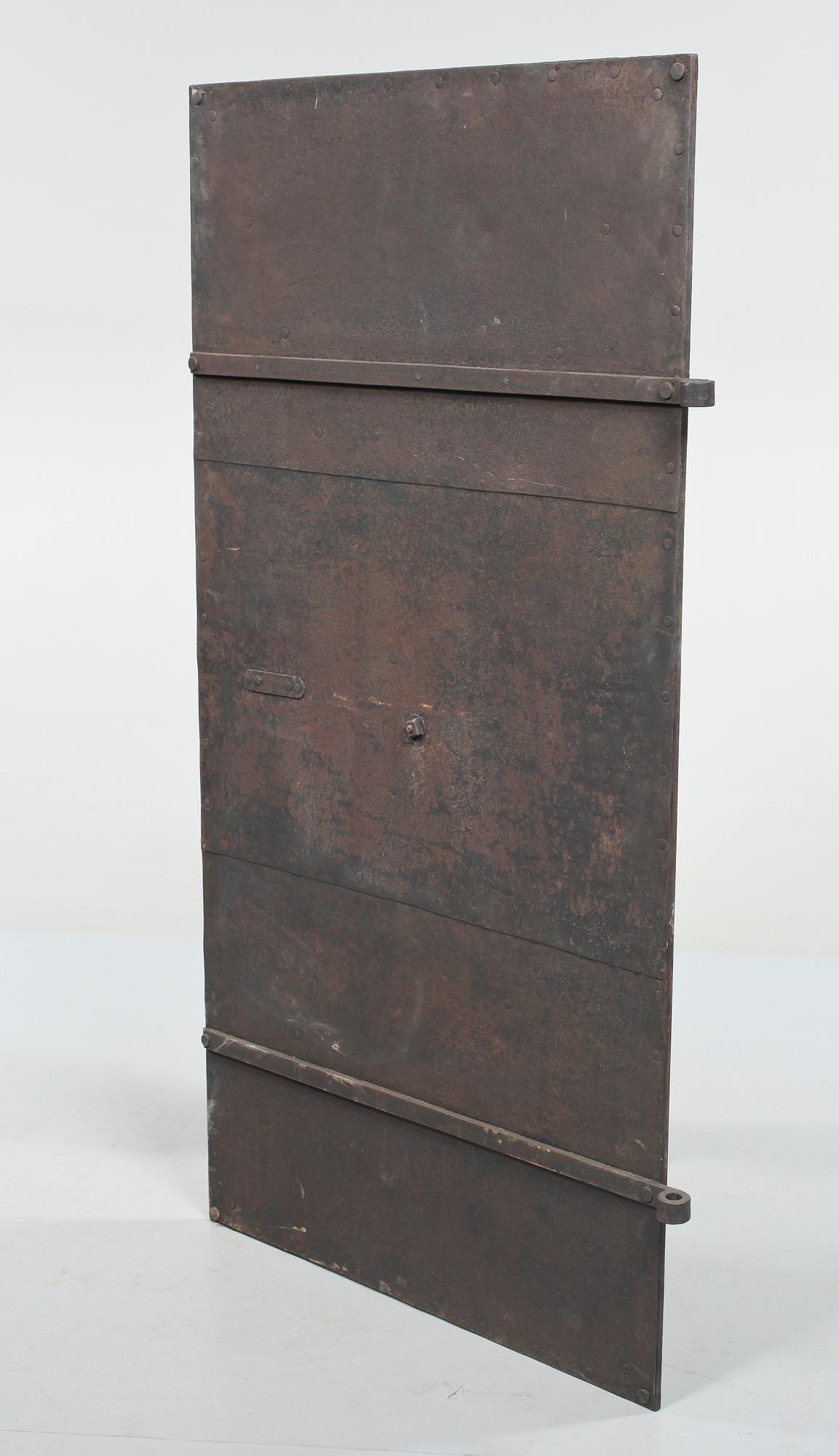 A 19th century metal and cast iron door.
