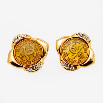 Chanel, earclips, metal, plastic and paste, approx 2,5 cm.