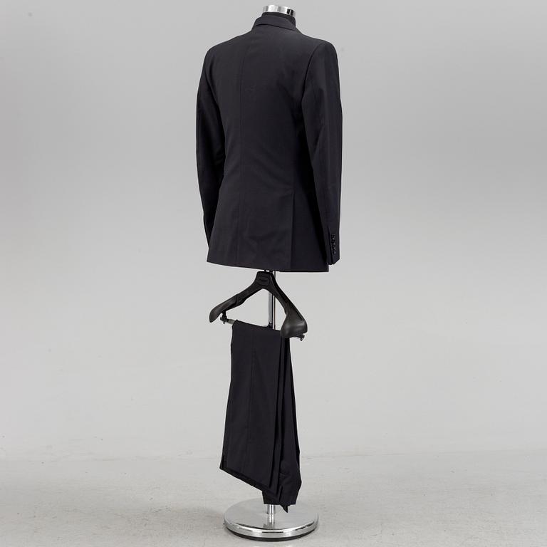 A suit by burberry, in size 48R.