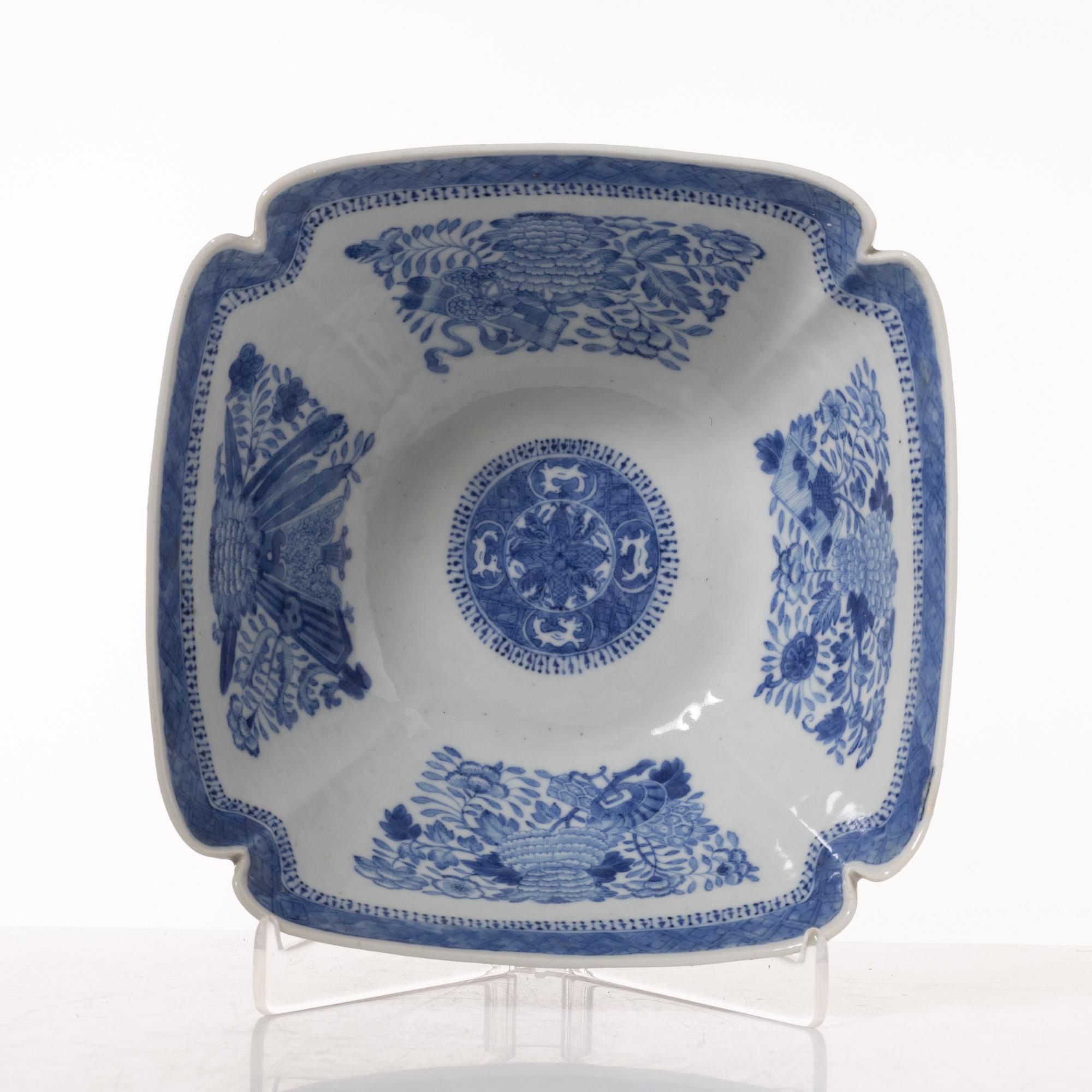 A group  of three serving dishes, a serving bowl, a cup, and seven plates, porcelain, including China 18th century.