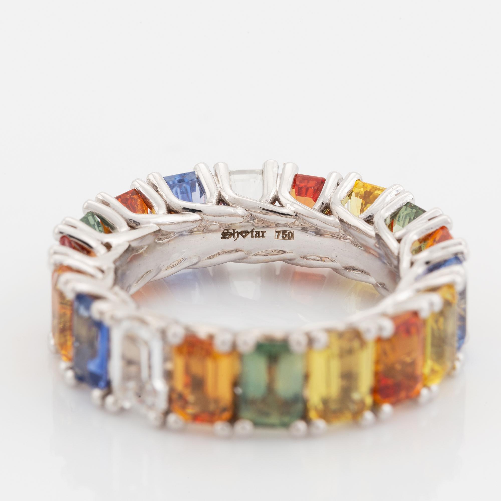Emerald cut multi coloured sapphire ring.