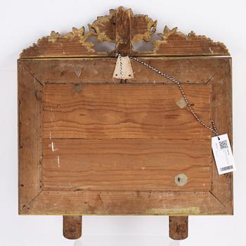 A pair of Swedish Empire mirror wall sconces, first half of the 19th century.