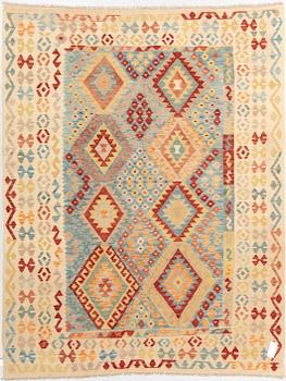 An oriental kilim, around 245 x 190 cm.