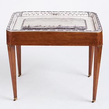 A Gustavian mahogany and faience tea table, late 18th century.