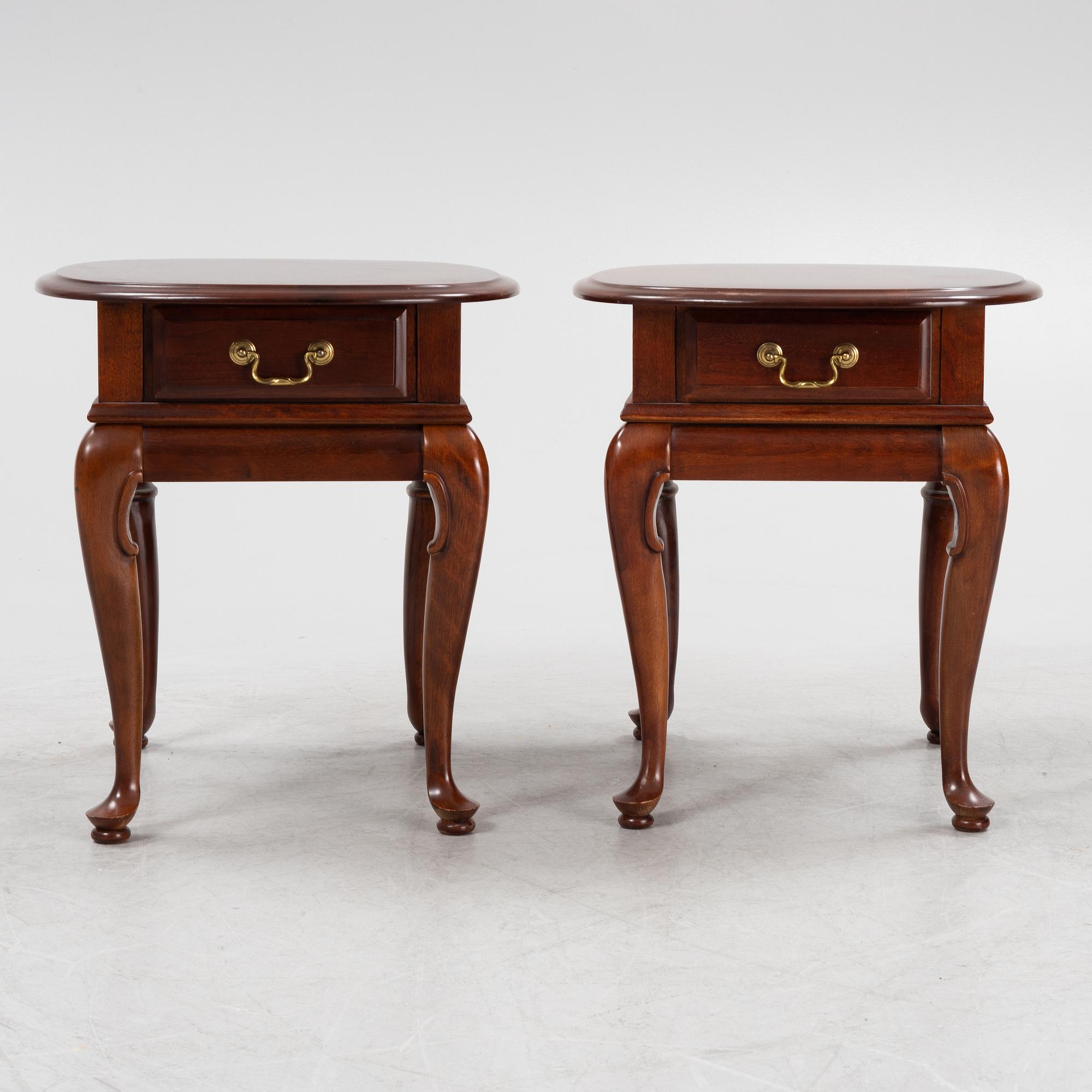 A pair of english style mahogany bedside tables, VIC, Canada, late 20th century.