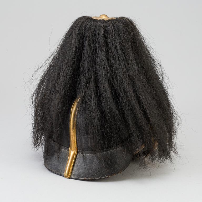 A Swedish military 
officer helmet m/1894.