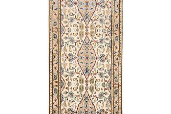 A Kashan runner carpet, c. 344 x 81 cm.