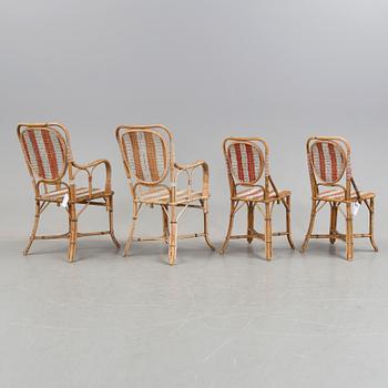 A set of two armcharirs and two easy rattan chairs, early 20th century.