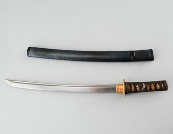 A japanese wakizashi, signed.