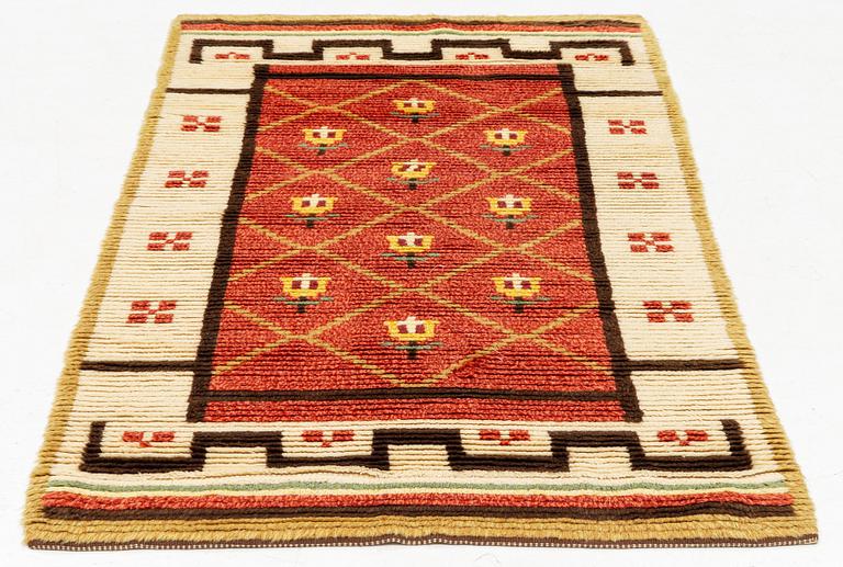 A rya (knotted pile) rug 201 x 107 cm.