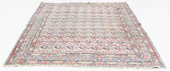 A Persian rug, c. 220 x 140 cm.