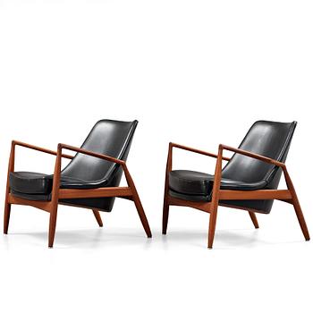 46. Ib Kofod-Larsen, a pair of 'Seal' easy chairs by OPE Fåtöljindustri, Sweden 1950-60's.