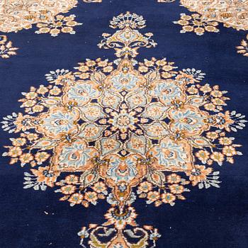 A carpet old Kerman, around 266 x 181 cm.