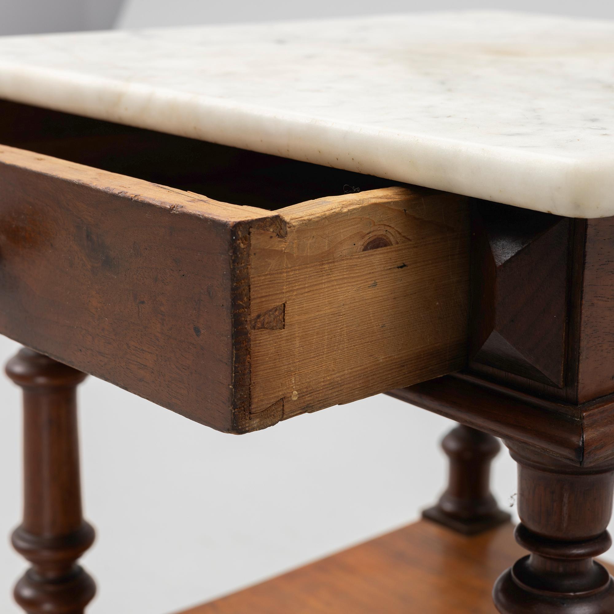 An early 20th century bedside table.