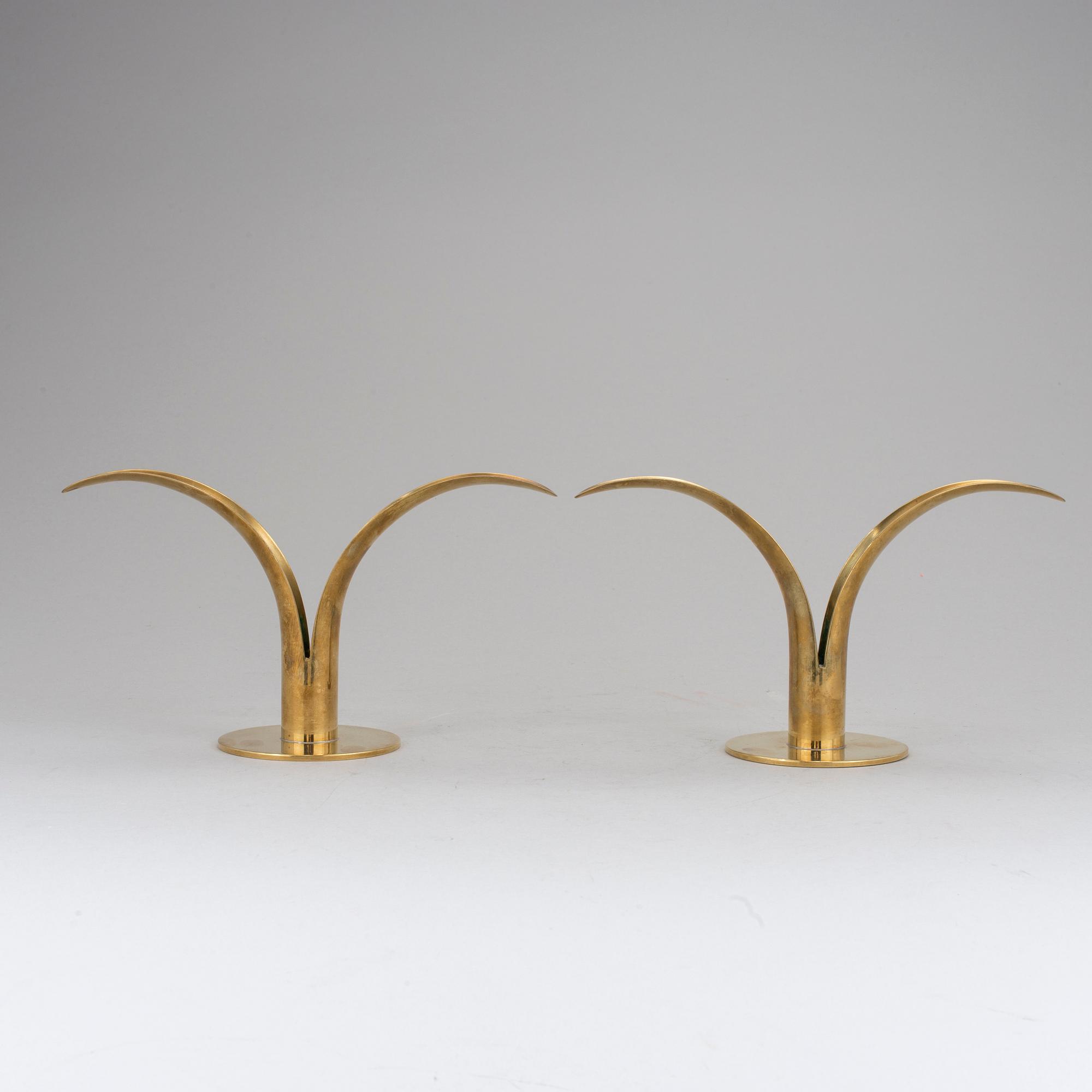 IVAR Alenius-Bjork, a pair of candlesticks, brass, "Lily, Ystad Metall. The model designed in 1939.