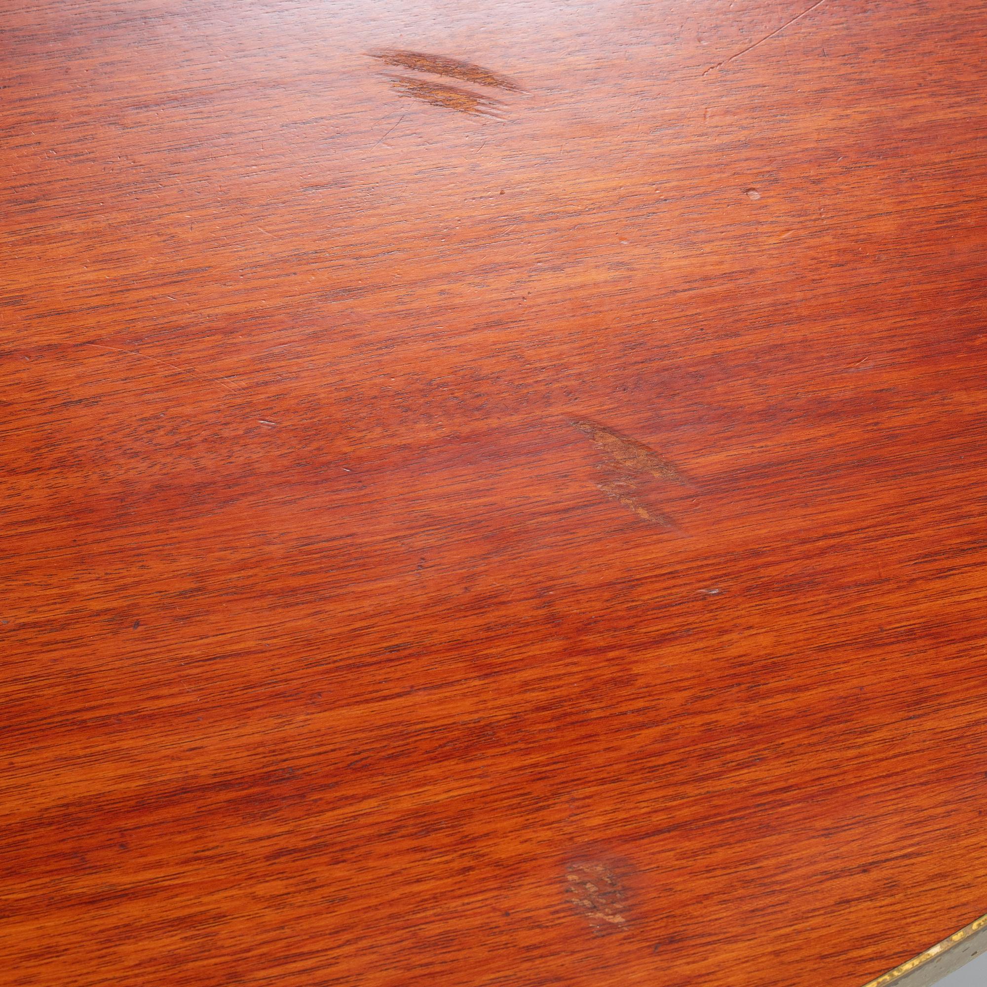 A mid 20th century dining table.