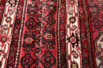 A Hosseinabad carpet, c. 310 x 210 cm.