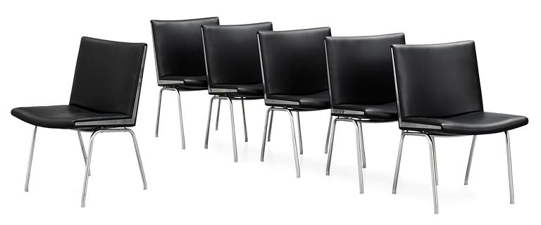 A set of six Hans J Wegner 'Kastrup' steel and black leather chairs, AP-stolen, Denmark.