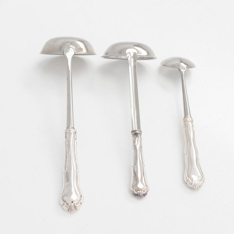 A 78-piece silver 'Chippendale' cutlery set, 1978-2007. Various Finnish manufacturers.