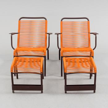 a pair of FRÉDÉRIC SOFIA "Saint Tropez" lounge chairs with footstools, by Fermob.