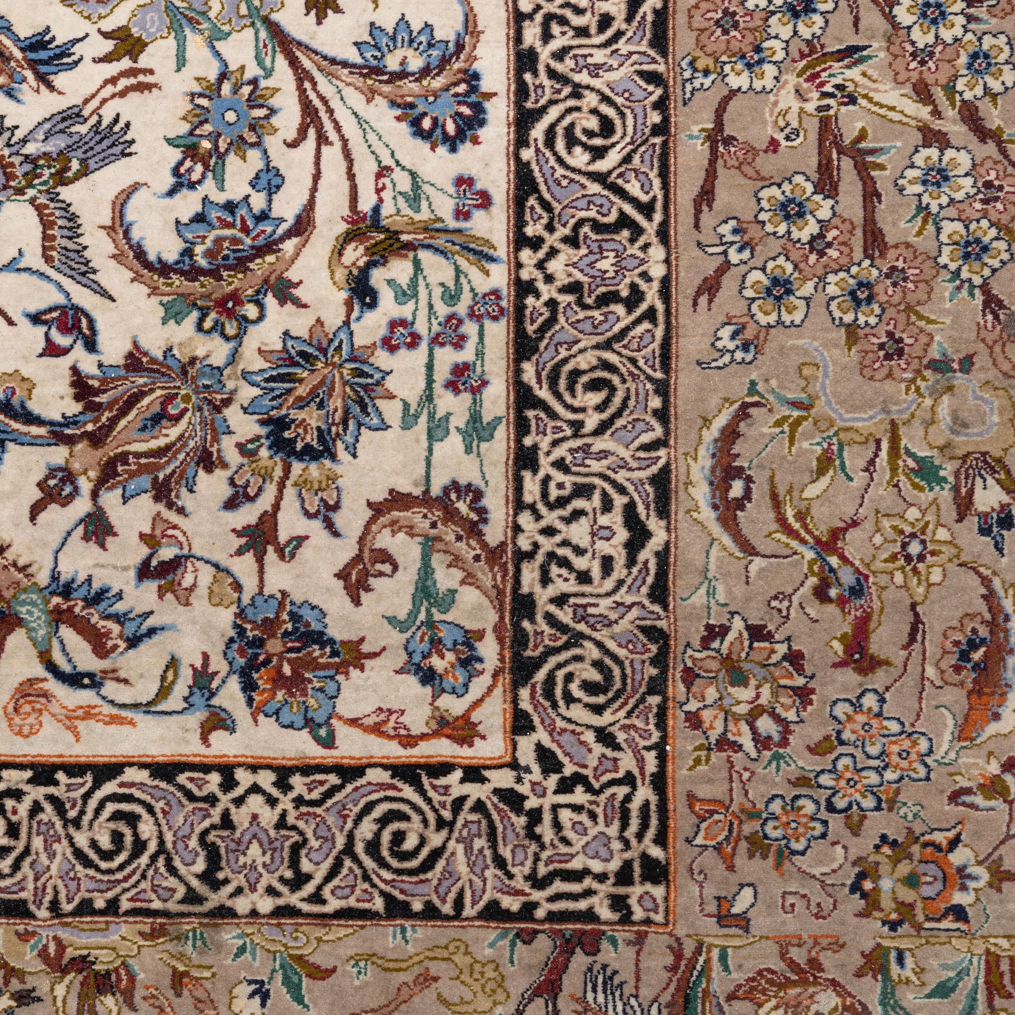 A signed pictoral Isfahan rug, Central Persia (Iran), signed, c. 235 x 154 cm.