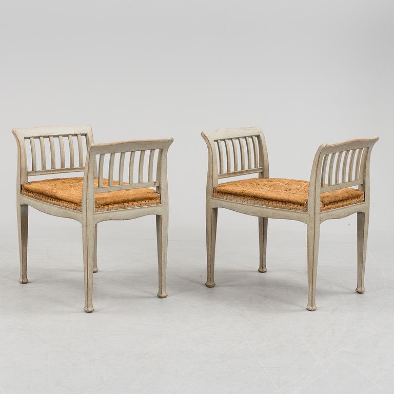 A pair of earlt 20 th century stools.
