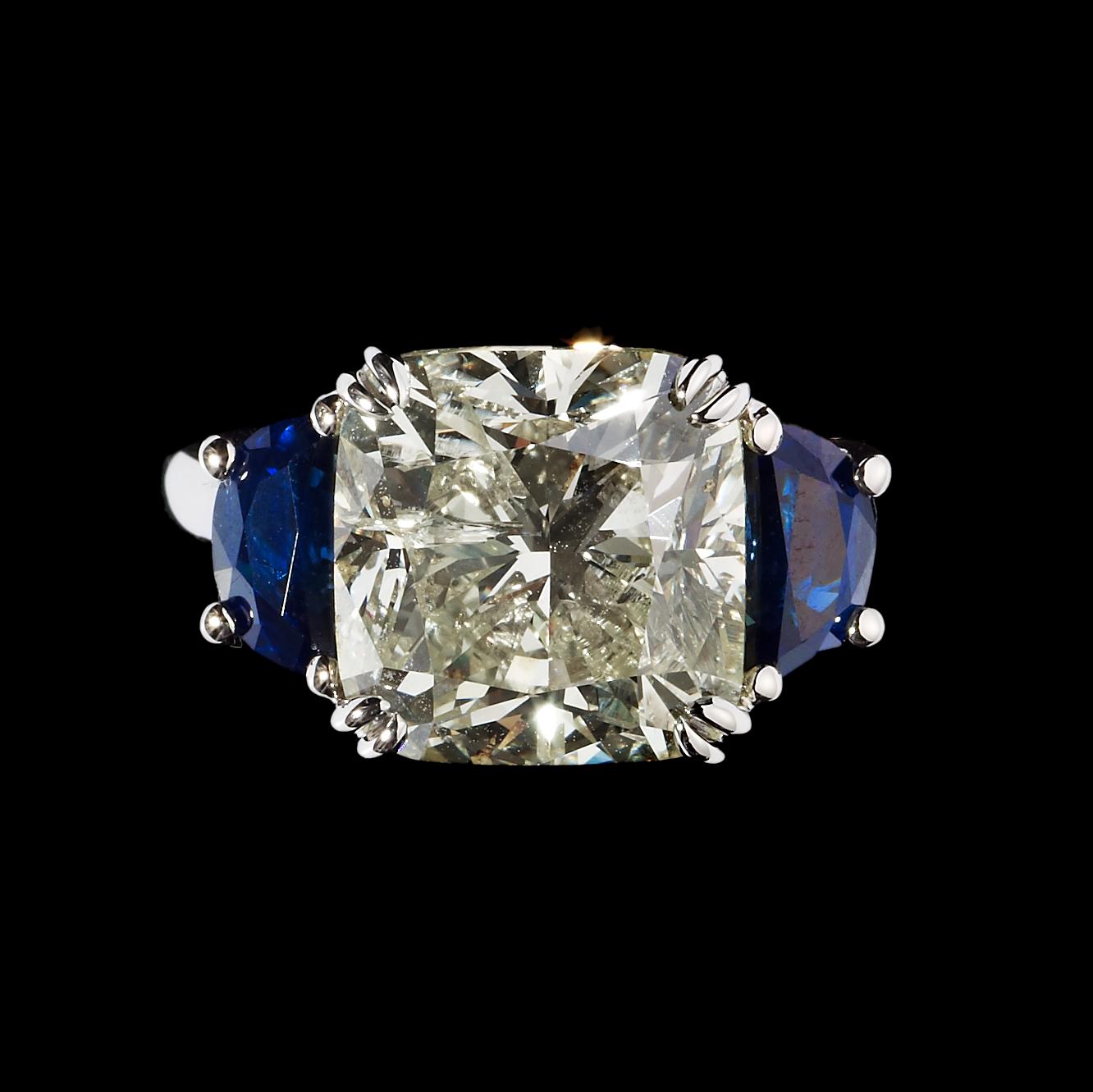 A platinum and cushion cut diamond ring, 6.52 cts.