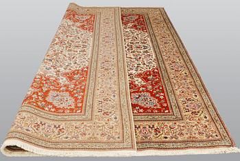 A carpet, Figural Tabriz, so called,  Tabatabai, 380 x 282 cm.