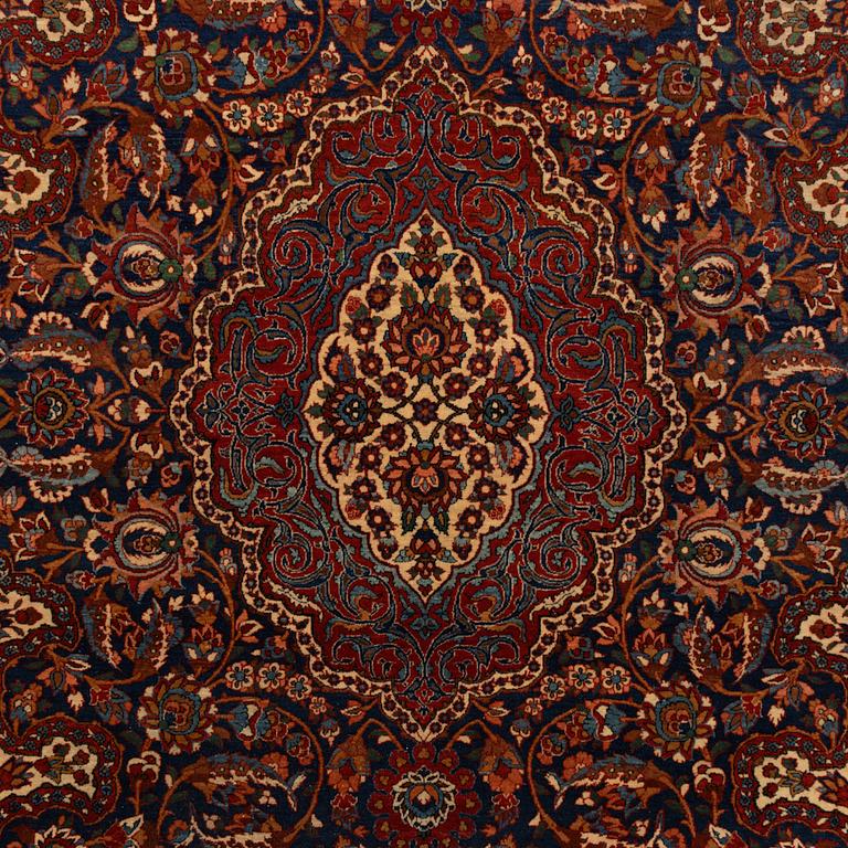 A semi-antique Isfahan rug, central Persia, c. 305 x 205 cm.