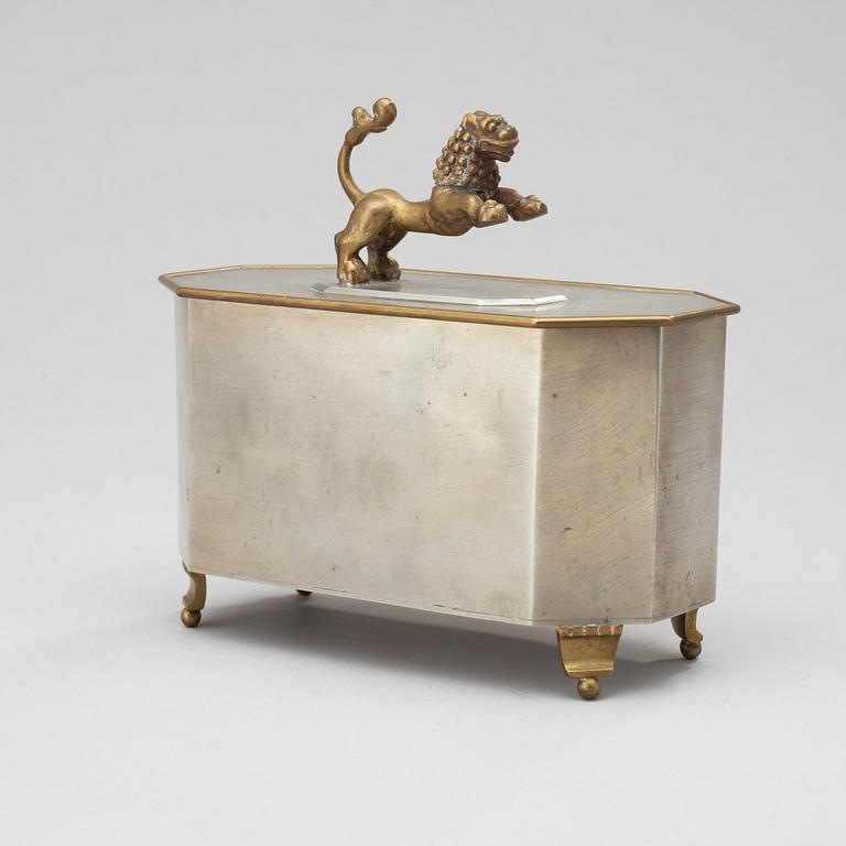 A Swedish Grace pewter and brass box, 1930.