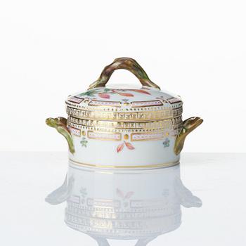 A set with a Royal Copenhagen 'Flora Danica' triangular dish, a sugar bowl with cover and three small dishes, Denmark,