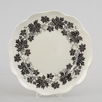 Arthur Percy, 57 pieces of a "Vinranka" creamware service, Gefle, Sweden, first half of the 20th century.