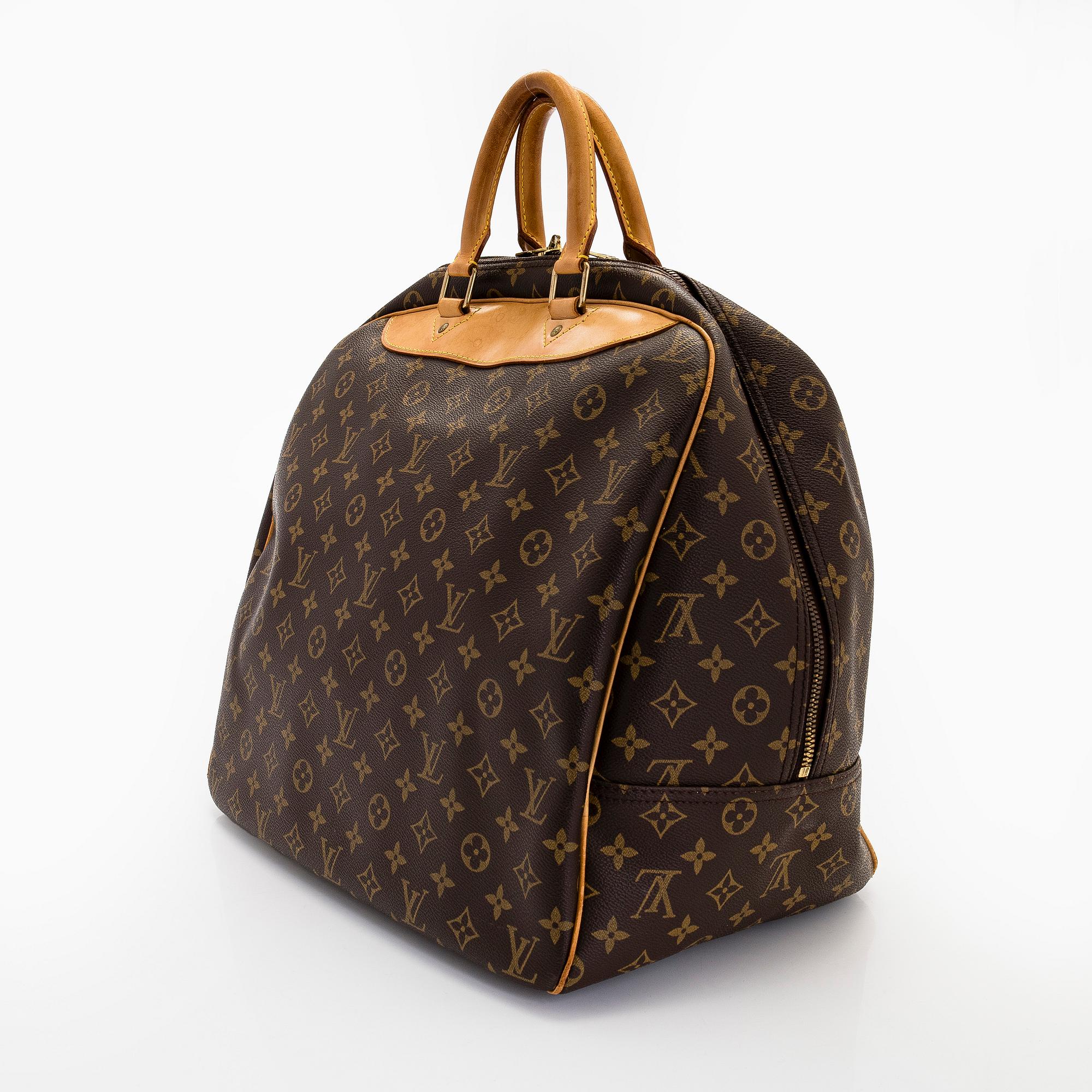 Louis Vuitton, a Monogram Canvas 'Evasion' weekend bag.