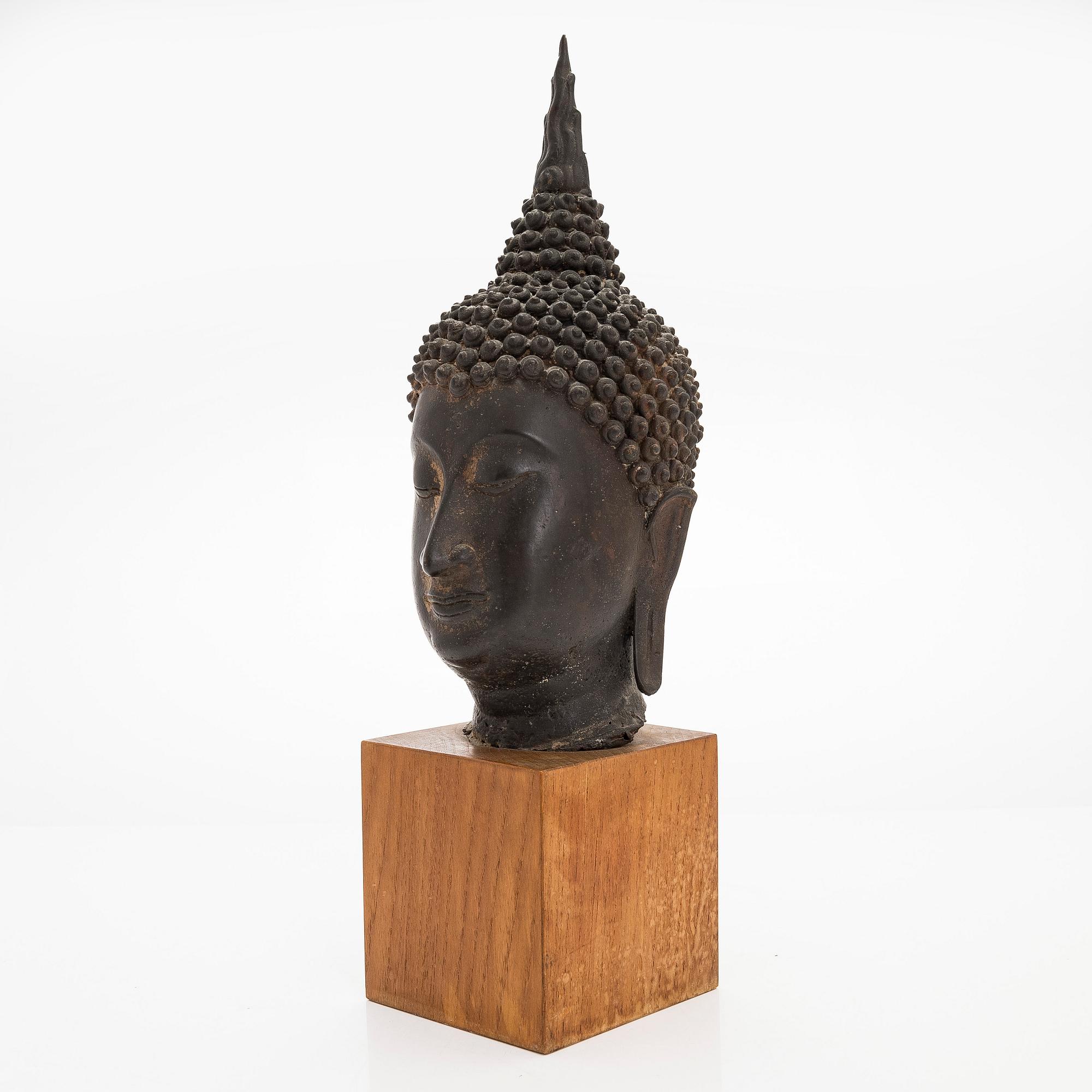A patinated metal sculpture from Thailand, 20th century.
