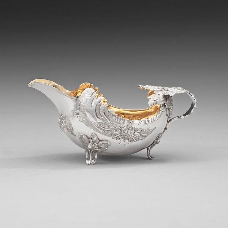 A Swedish 18th century parcel-gilt cream-jug, marks of Fredrik Petersson Ström, Stockholm 1774.