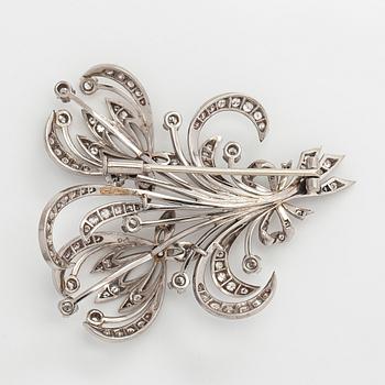 A. Tillander, Brosch, palladium med briljant- och åttkantslipade diamanter. Helsingfors.