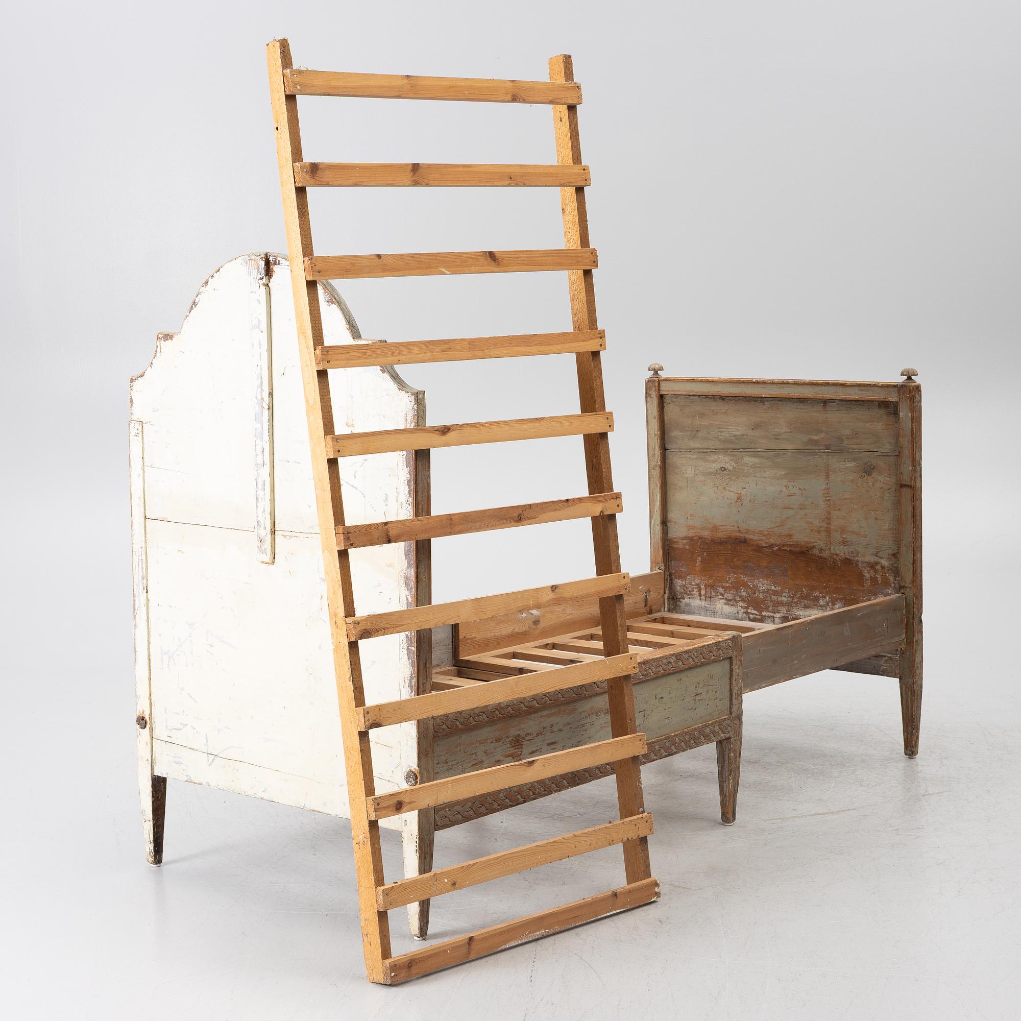 A Gustavian carved bedframe, late 18th century.