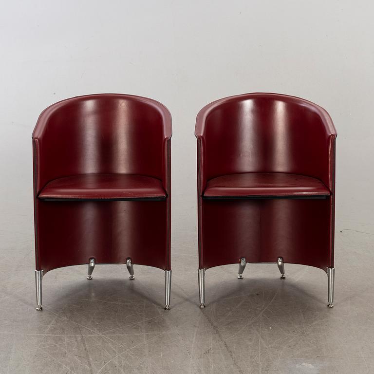A pair of late 20th century armchairs.