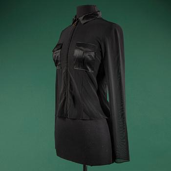 A blouse by  CHRISTIAN DIOR, in size 40(FR).